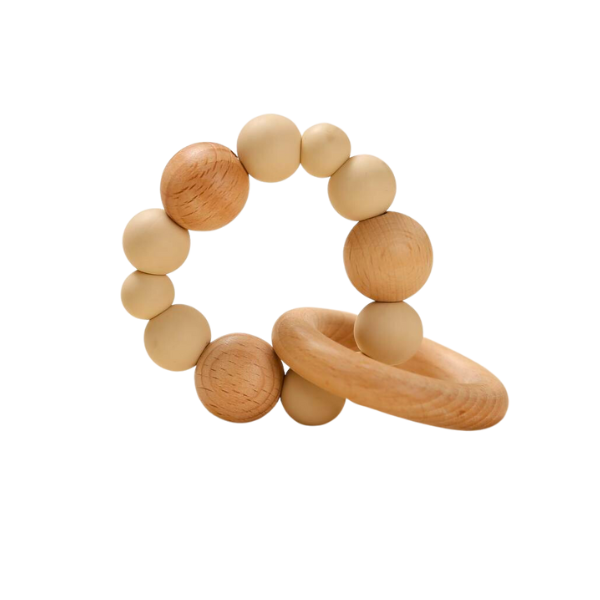Cream and tan baby teething ring made up on different sized balls