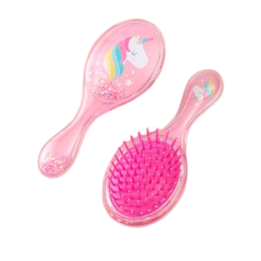 Small pink hairbrush with a colourful unicorn and sequins on the back.
