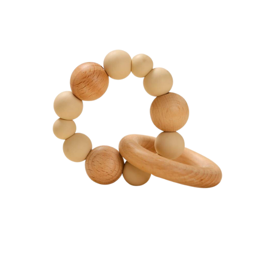 Cream and tan baby teething ring made up on different sized balls